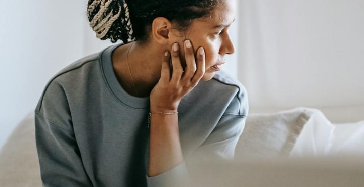 Woman looking thoughtful and depressed